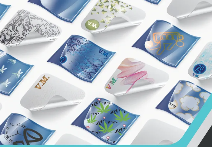 A selection of custom-printed Vision Meditech patches with different shapes, colours and foil finishes